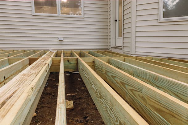 Installing a new wooden deck on a home